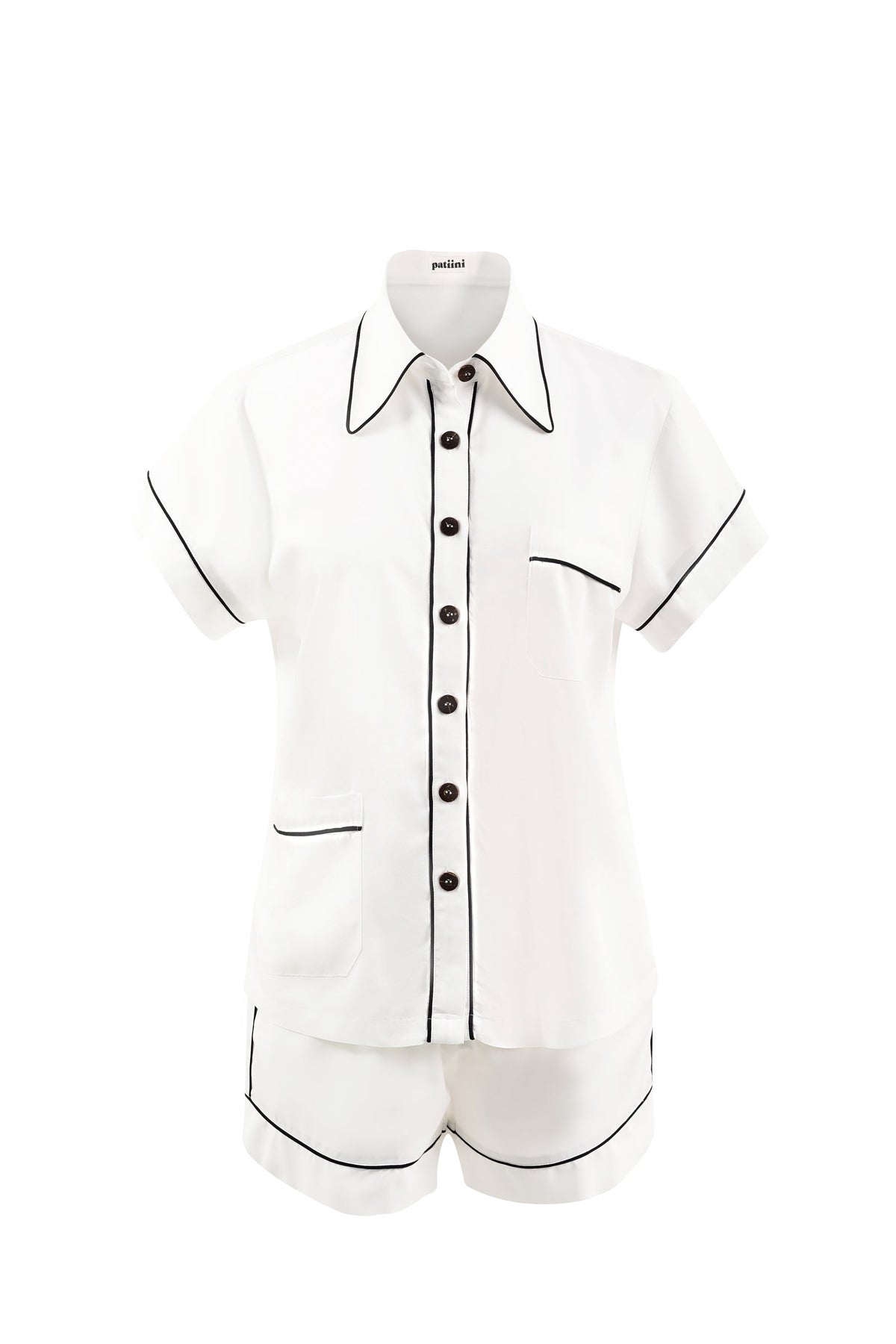 White short-sleeve pajama set with contrasting black piping.