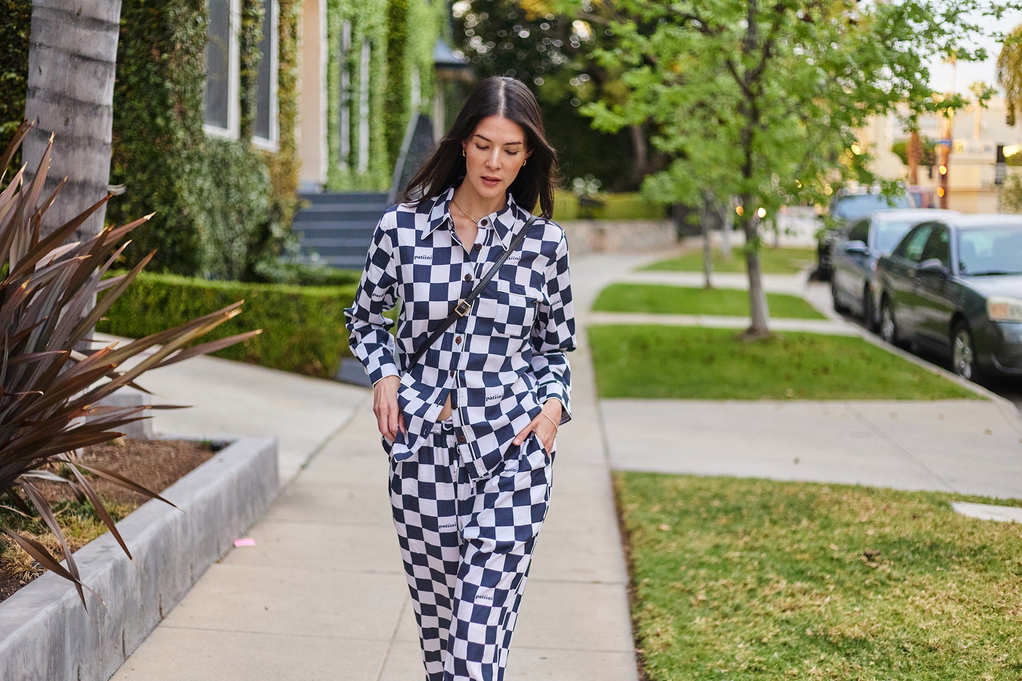 Black and white checkered long-sleeve pajama set with white piping.