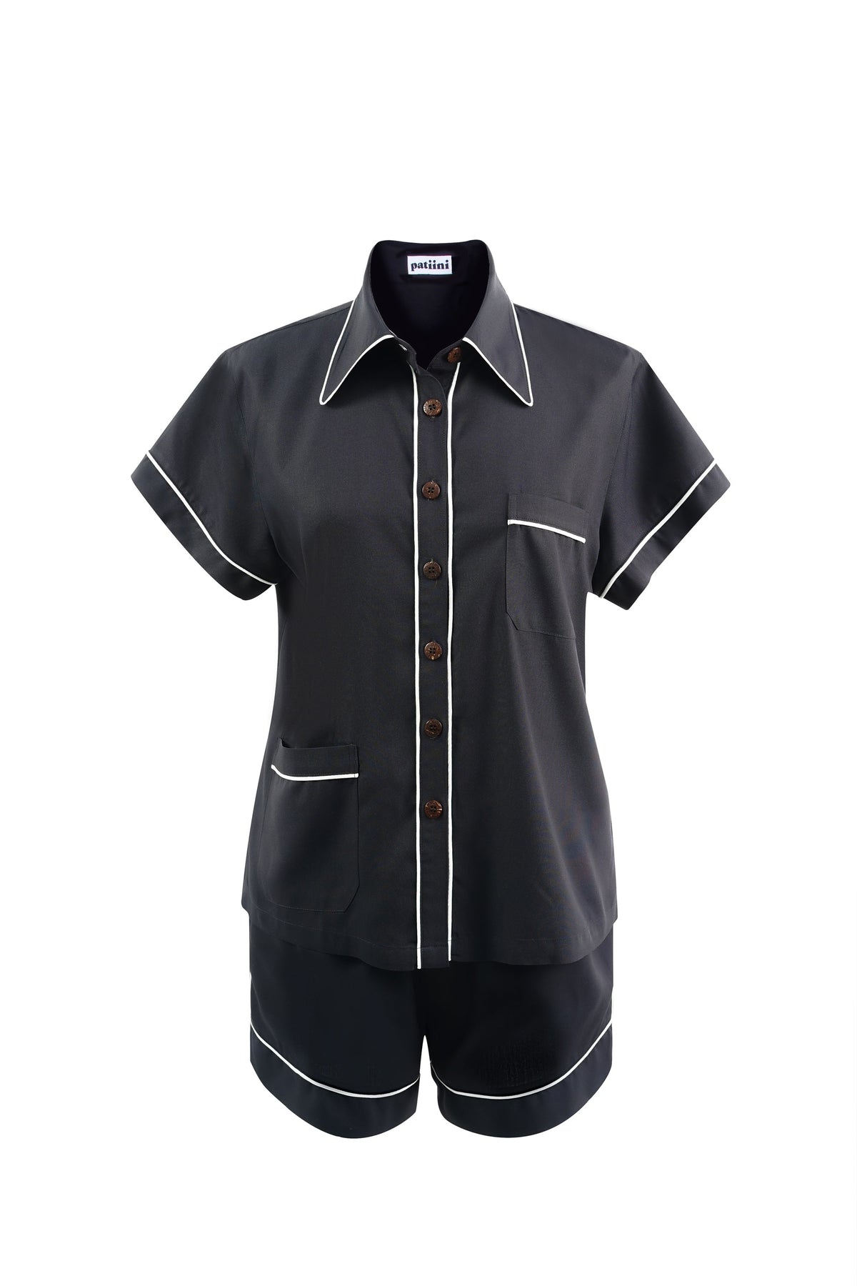 Black short-sleeve pajama set with contrasting white piping.