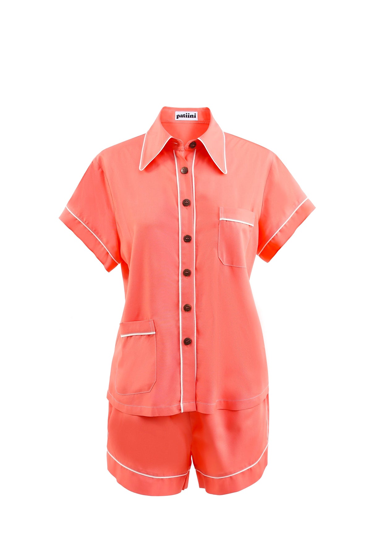 Coral short-sleeve pajama set with white contrasting piping.